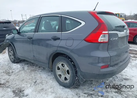 2015 Honda Cr-V Lx z USA, uszkodzony, nr VIN 5J6RM4H37FL104892